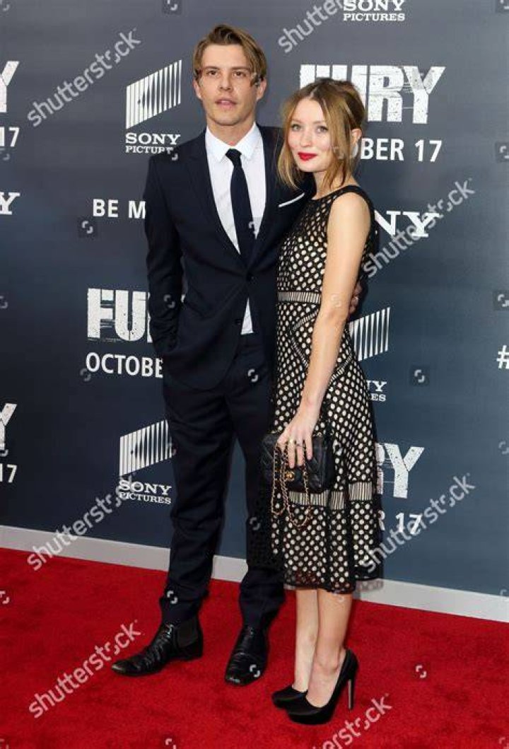 Actors Xavier Samuel, left, and Emily Browning arrive for the world