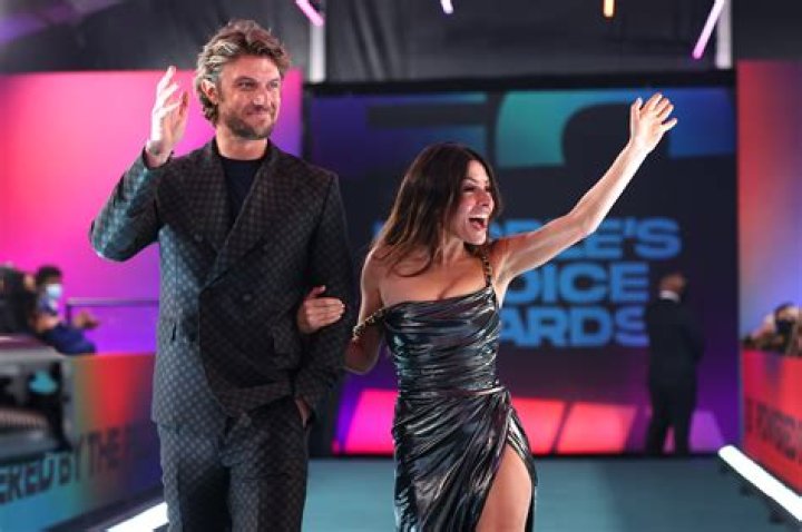 Adam Demos Poses with His OnScreen and RealLife Partner Sarah Shahi