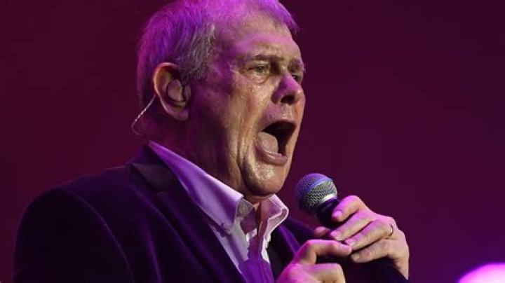 John Farnham likely to spend ‘weeks’ in hospital, will have tube put in