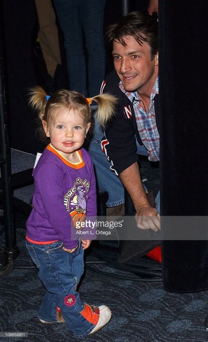 Nathan Fillion with his youngest fan Nathan fillion, Celebrities then